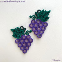 Two finished mirrored Grape Cluster FSL embroidery pieces with purple grapes, green leaves and hanging loops