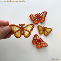 Actual orange and golden Monarch Butterfly FSL stitch-outs with open cutwork and lace-filled wings