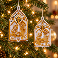 Two Holy Family lace ornaments hanging on a Christmas tree, with gold nativity details and warm lights behind them.
