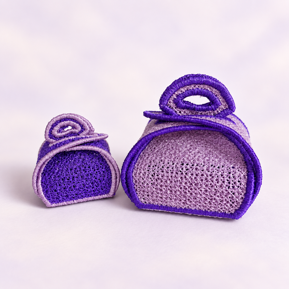Two finished purple and lavender FSL gift boxes in different sizes with lace sides and decorative loop handles