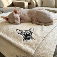 Sphynx cat embroidery design mockup on cream blanket with real Sphynx cat
