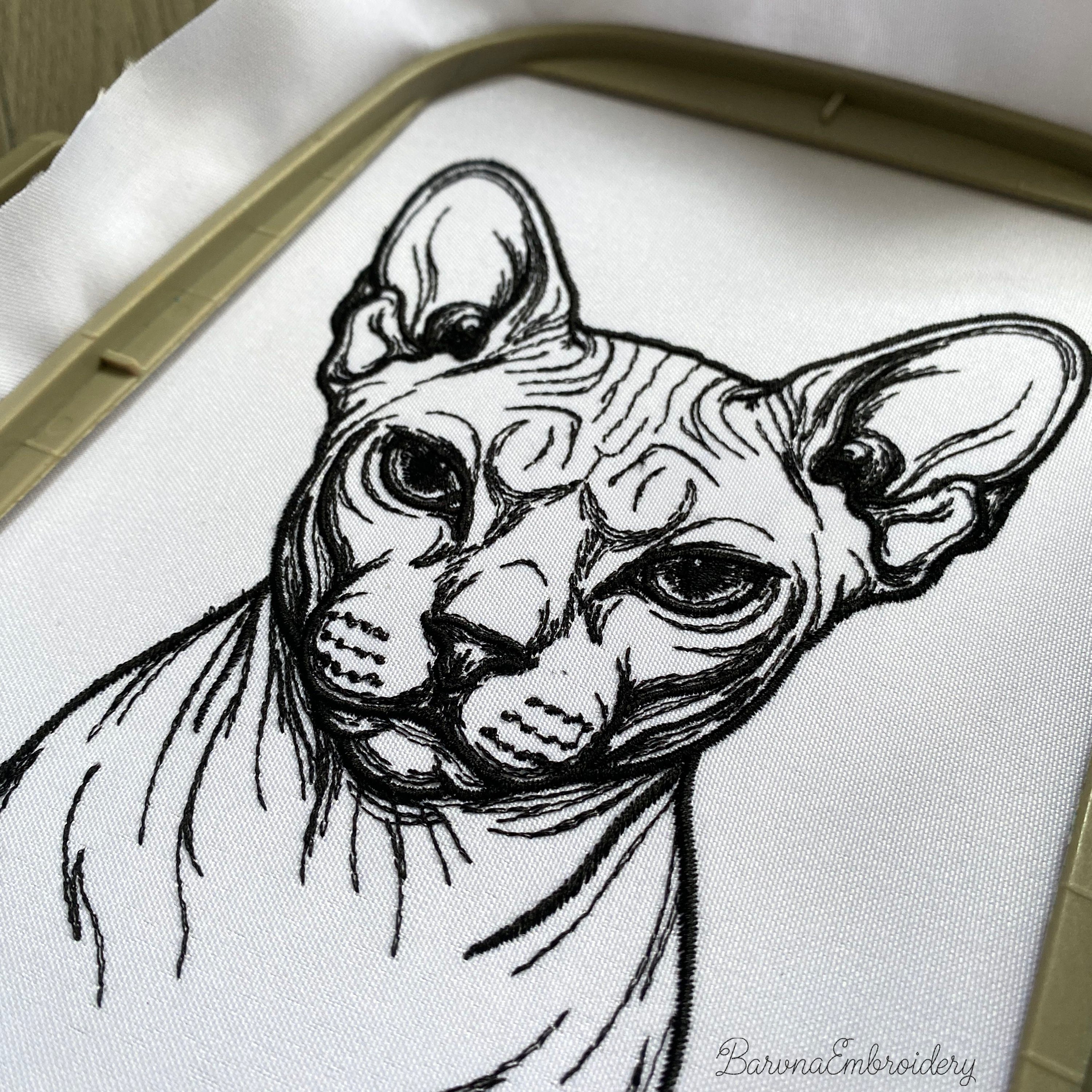 Close-up detail of stitched Sphynx cat embroidery showing fine line texture