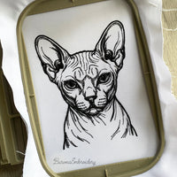 Finished Sphynx cat face embroidery stitched out on fabric in hoop - BarvnaEmbroidery